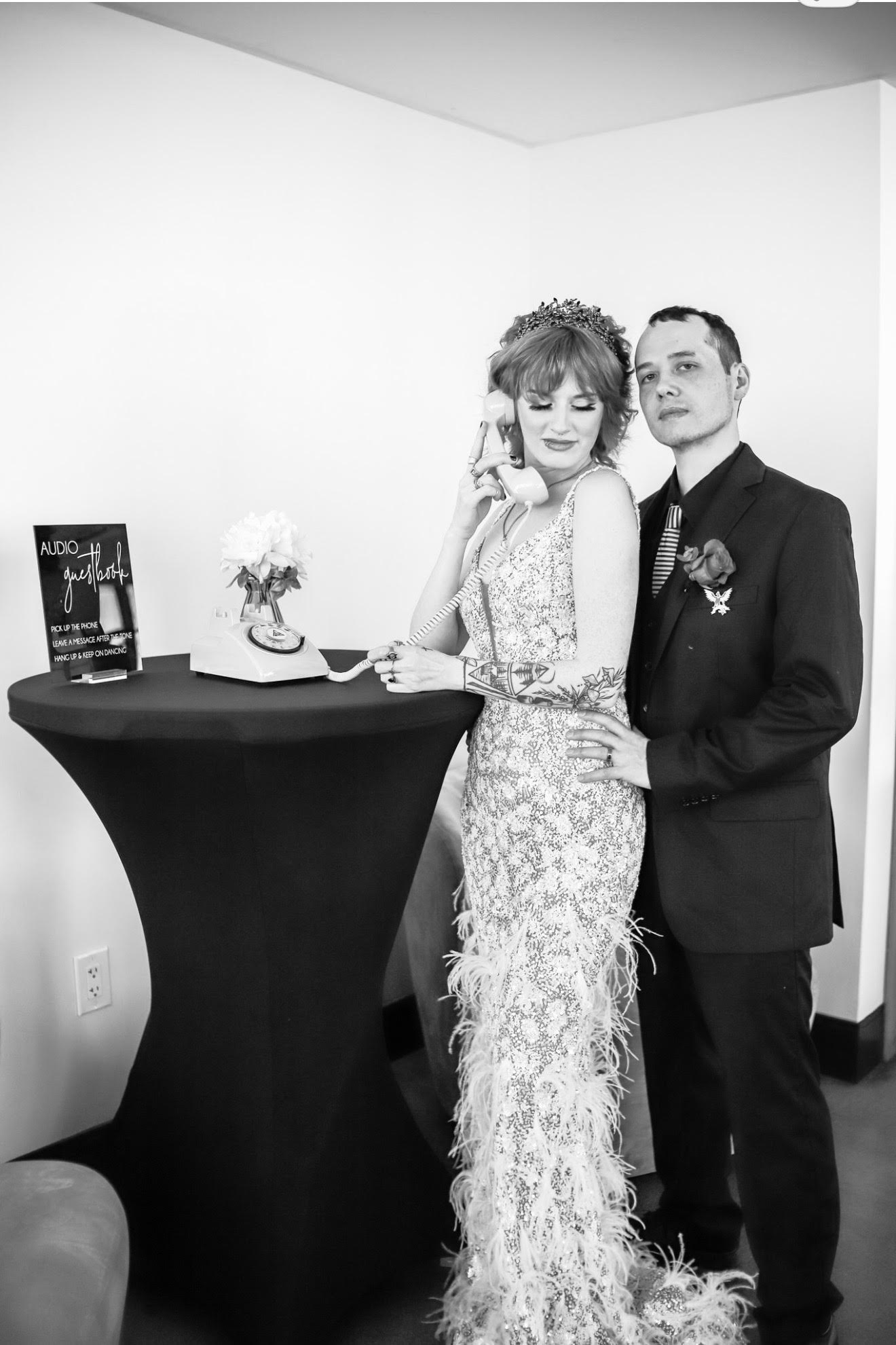 Couple using the audio guestbook telephone